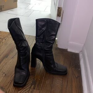 Black leather heeled boots